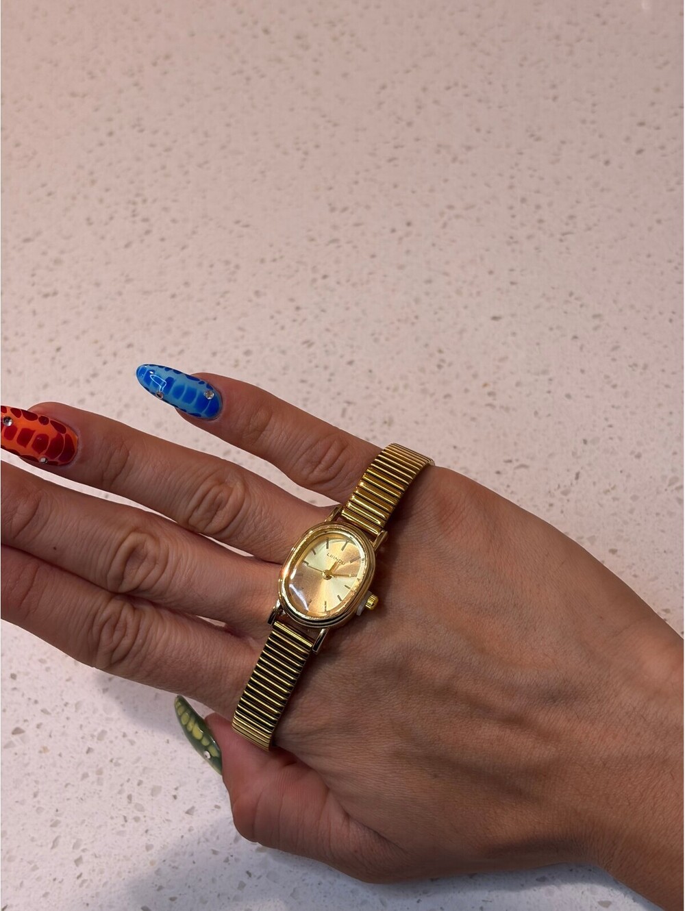 Gold Tone Women's Wristwatch with Expandable Band